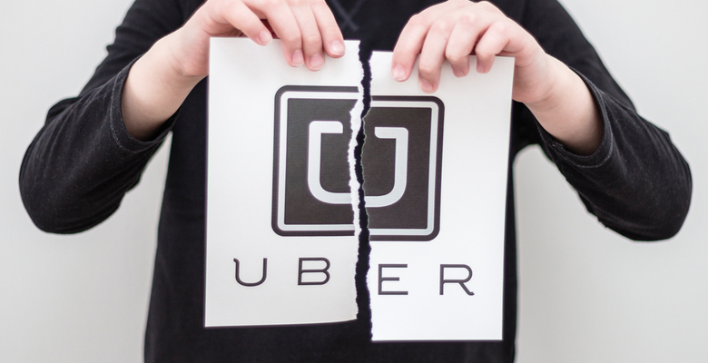 Британский суд признал водителей Uber его сотрудниками